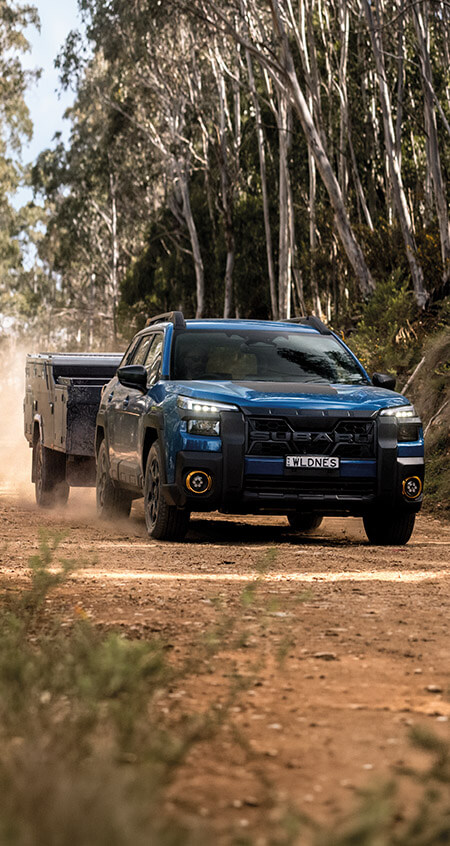 https://cdn.oem-production.subaru.com.au/media/0z0cf5iz/my26-outback-wilderness-apex-towing-with-an-outback-banner-xs-mobile-450x846-1.jpg