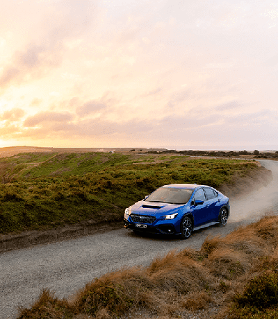 https://cdn.oem-production.subaru.com.au/media/4d0fsicp/my24-wrx-awd-front-driving-coastal-road-400x460.png