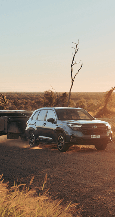 https://cdn.oem-production.subaru.com.au/media/cdbclv0n/my26-forester-awd-touring-hero-towing-450x846.png