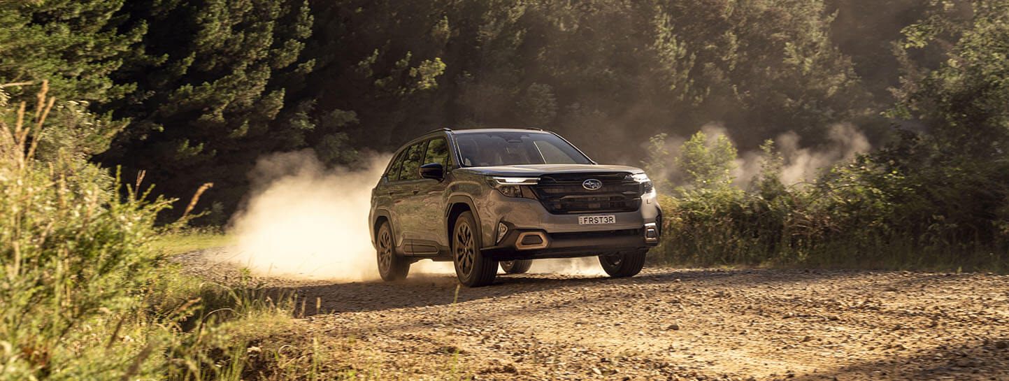 https://cdn.oem-production.subaru.com.au/media/e00bktca/my26-forester-awd-hybrid-sport-front-driving-forester_1443x545px.jpg