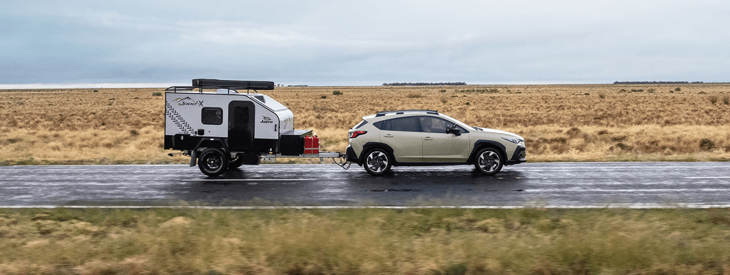 https://cdn.oem-production.subaru.com.au/media/k5lbhej2/crosstrek-towing-page-banner-xl-1443x545px.png