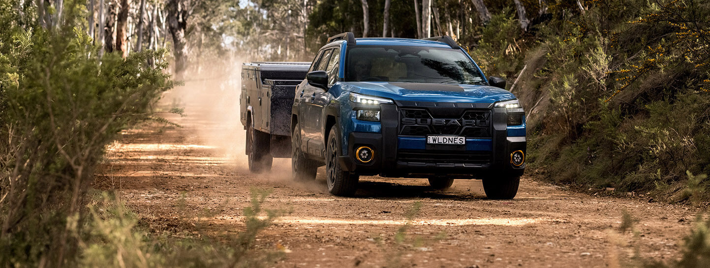https://cdn.oem-production.subaru.com.au/media/tdnlkxnf/my26-outback-wilderness-apex-towing-with-an-outback-banner-xl-desktop-1443x545.jpg
