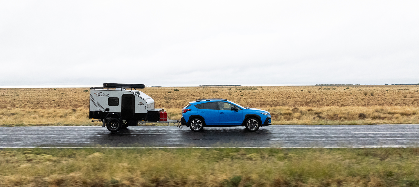 https://cdn.oem-production.subaru.com.au/media/waebb4e2/crosstrek-towing-landing-page-header.png